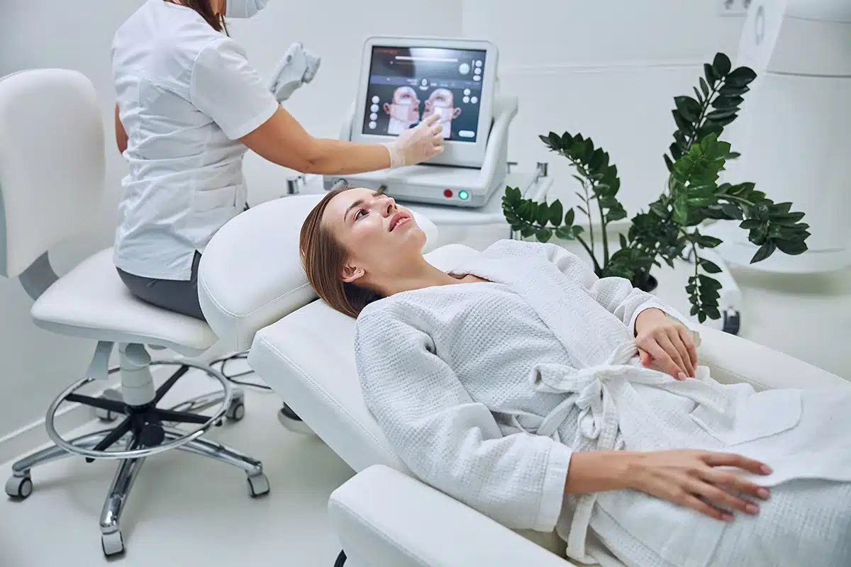 Pretty young Caucasian female waiting spa treatment procedure in beauty clinic